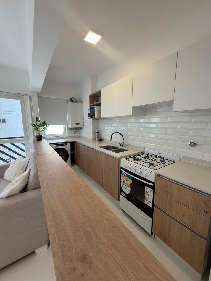 Venta Departamento de 3 ambientes con cochera, Santa Fe y 9 de Julio.